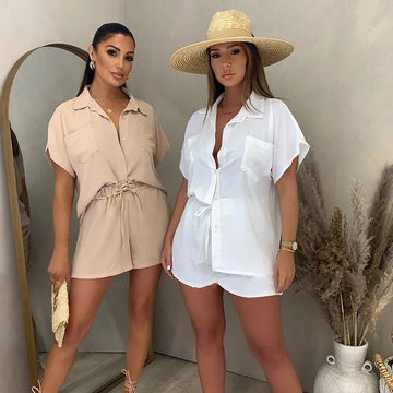 Both ladies wearing highsta button up shirt with shorts female.