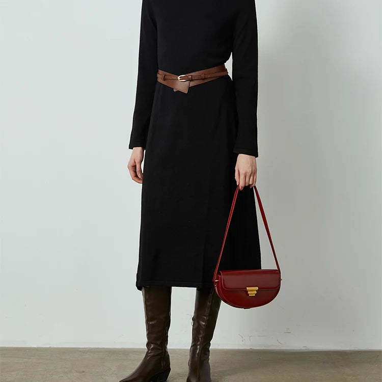 footage of a Young lady carrying highsta hs one of the best designer shoulder handbags, Aure Saddle Handbag.